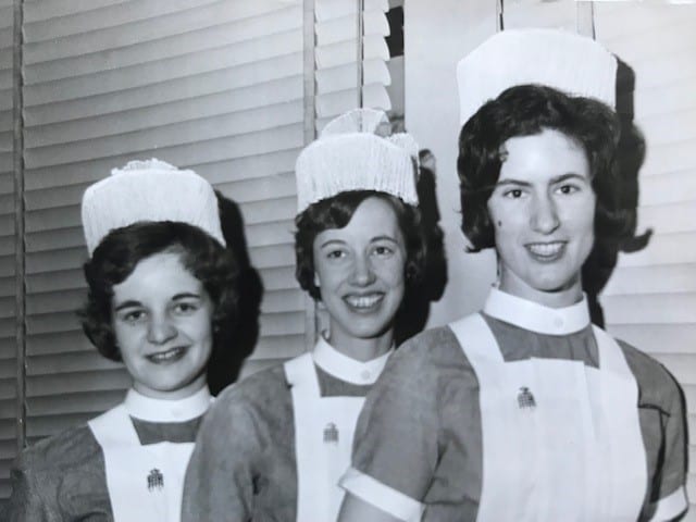 Black & white photo of nurses in uniform